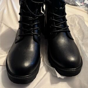 Aqua Diva water proof leather boots currently selling on Amazon for $120